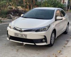 Toyota Corolla altis 2018 - Lên đời bán xe Toyota Corolla altis năm 2018, màu trắng giá 650 triệu tại Cần Thơ