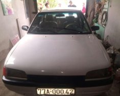 Mazda 323   1995 - Cần bán Mazda 323 năm 1995, màu trắng, nhập khẩu  giá 50 triệu tại Vĩnh Long