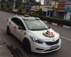 Kia K3 AT 2014 - Bán Kia K3 AT sản xuất 2014, màu trắng chính chủ  giá 505 triệu tại Tp.HCM