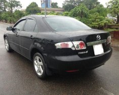 Mazda 6 MT 2003 - Bán Mazda 6 MT năm 2003, màu đen, nhập khẩu nguyên chiếc, giá tốt giá 325 triệu tại Tp.HCM