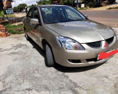 Mitsubishi Lancer 2004 - Bán Mitsubishi Lancer đời 2004, màu vàng, xe nhập xe gia đình giá 175 triệu tại Gia Lai