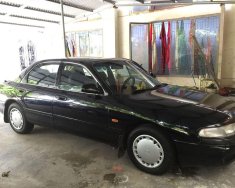 Mazda 626 1996 - Cần bán Mazda 626 sản xuất 1996, màu đen xe gia đình, 70 triệu giá 70 triệu tại TT - Huế