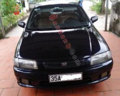 Mazda 323 2000 - Cần bán xe Mazda 323 năm 2000, màu đen chính chủ, giá 70tr giá 70 triệu tại Ninh Bình