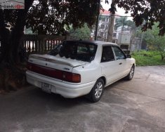 Mazda 323 1995 - Bán xe Mazda 323 sản xuất 1995, màu trắng giá 50 triệu tại Tuyên Quang