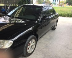 Kia Spectra 2003 - Cần bán lại xe Kia Spectra sản xuất 2003, màu đen, xe nhập chính chủ giá 95 triệu tại Hải Dương