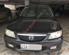 Mazda 323   2003 - Bán Mazda 323 năm 2003, màu đen, giá chỉ 155 triệu giá 155 triệu tại Hòa Bình