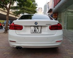 BMW 3 Series  320i   2016 - Cần bán lại xe BMW 3 Series 320i 2016, màu trắng, nhập khẩu nguyên chiếc giá 1 tỷ 65 tr tại Hà Nội