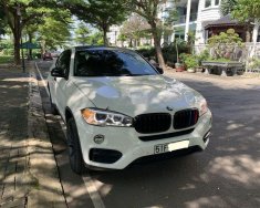 BMW X6     2014 - Cần bán xe BMW X6 đời 2014, màu trắng, nhập khẩu nguyên chiếc xe gia đình giá 2 tỷ 100 tr tại Tp.HCM