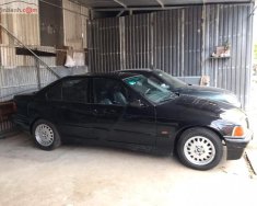 BMW 3 Series 320i 1996 - Bán BMW 3 Series 320i đời 1996, màu đen, xe nhập còn mới, 105 triệu giá 105 triệu tại Tp.HCM