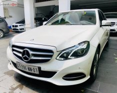 Mercedes-Benz E class 250 2014 - Bán Mercedes E250 sản xuất 2014, màu trắng đẹp như mới giá 1 tỷ 250 tr tại Tp.HCM