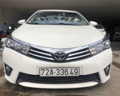 Toyota Corolla 2015 - Cần bán gấp Toyota Corolla sản xuất năm 2015, màu trắng số tự động, 570 triệu giá 570 triệu tại Hà Nội