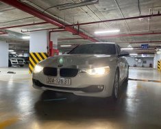 BMW 3 Series   2014 - Cần bán lại xe BMW 320i sản xuất 2014, màu trắng, xe nhập, giá 750tr giá 750 triệu tại Hà Nội