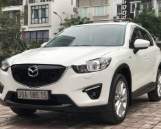 Mazda CX 5   2014 - Cần bán xe Mazda CX 5 năm sản xuất 2014, màu trắng giá 640 triệu tại Hà Nội