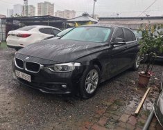 BMW 3 Series   2015 - Bán ô tô BMW 320i sản xuất 2015, màu đen, form 2016 giá 945 triệu tại Hà Nội