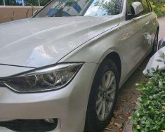 BMW 3 Series   2012 - Bán BMW 320i sản xuất năm 2012, màu trắng, nhập khẩu  giá 750 triệu tại Tp.HCM