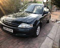 Ford Laser   2001 - Bán Ford Laser sản xuất năm 2001, màu đen  giá 89 triệu tại Đồng Tháp