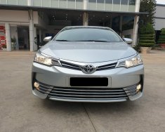 Toyota Corolla altis 1.8G 2018 - Cần bán xe Toyota Altis 1.8G AT 2018 màu bạc, xe đi ít giữ kĩ chính hãng Toyota Sure giá 700 triệu tại Tp.HCM