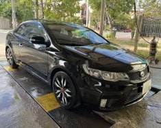 Kia Cerato 2010 - Cần bán lại xe Kia Cerato đời 2010, màu đen, xe nhập còn mới giá 345 triệu tại Quảng Trị