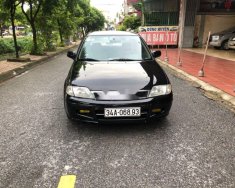 Ford Laser   LX 1.6 MT 2001 - Cần bán Ford Laser LX 1.6 MT sản xuất năm 2001, màu đen số sàn, 98 triệu giá 98 triệu tại Hải Dương