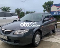 Mazda 323    2001 - Cần bán xe Mazda 323 đời 2001, màu xám, xe nhập còn mới giá 115 triệu tại TT - Huế