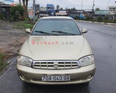 Kia Spectra   1.6 MT  2004 - Xe Kia Spectra 1.6 MT sản xuất năm 2004, màu vàng còn mới, 90 triệu giá 90 triệu tại Tiền Giang