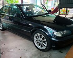 BMW 325i 2004 - Cần bán lại xe BMW 325i đời 2004, màu đen xe gia đình, giá tốt giá 200 triệu tại Đà Nẵng