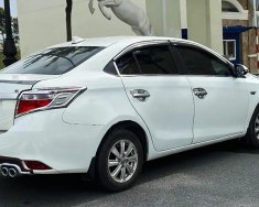 Toyota Vios   J   2014 - Cần bán Toyota Vios J đời 2014, màu trắng còn mới, giá tốt giá 260 triệu tại Bình Dương