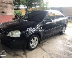 Daewoo Lacetti 2004 - Xe Daewoo Lacetti đời 2004, màu đen còn mới giá 108 triệu tại Kon Tum