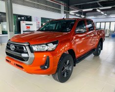 Toyota Hilux 2.4 4x2 AT 2021 - Toyota Hilux 2.4 AT 4X2 màu đỏ cam giao ngay tháng 11 giá 674 triệu tại Tiền Giang