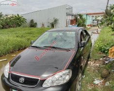 Toyota Corolla    2003 - Cần bán xe Toyota Corolla đời 2003, màu đen còn mới giá 129 triệu tại Sóc Trăng