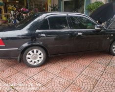 Ford Laser   GHIA 1.8 AT  2005 - Bán ô tô Ford Laser GHIA 1.8 AT sản xuất 2005, màu đen giá cạnh tranh giá 185 triệu tại Hà Tĩnh