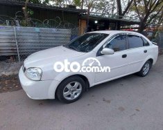 Daewoo Lacetti  SE  2004 - Bán xe Daewoo Lacetti SE năm sản xuất 2004, màu trắng giá 118 triệu tại Tp.HCM