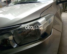 Toyota Vios E 2016 - Cần bán xe Toyota Vios E đời 2016, màu vàng cát chính chủ giá 279 triệu tại Hà Nội