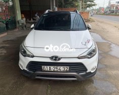 Hyundai i20 Active 2015 - Bán ô tô Hyundai i20 Active đời 2015, màu trắng, nhập khẩu nguyên chiếc chính chủ, 450 triệu giá 450 triệu tại Bình Dương