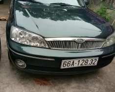 Ford Laser 2002 - Ford Laser 1.8MT bản đủ, 4 thắng đĩa ABS, vô lăng 4 chấu túi khí, xe công viên chức giá 135 triệu tại Tiền Giang