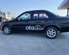 Mazda 323 2004 - Bán xe Mazda 323 đời 2004, màu đen xe gia đình giá 140 triệu tại Hải Dương