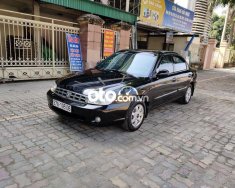 Kia Spectra MT 2004 - Cần bán Kia Spectra MT đời 2004, màu đen, giá chỉ 87 triệu giá 87 triệu tại Hà Tĩnh