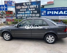 Ford Laser 2002 - Cần bán Ford Laser năm sản xuất 2002, màu xám giá 125 triệu tại Tiền Giang