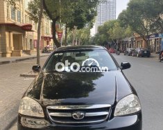 Daewoo Lacetti   EX 2010 - Cần bán Daewoo Lacetti EX sản xuất năm 2010, màu đen số sàn, giá 150tr giá 150 triệu tại Hà Nội