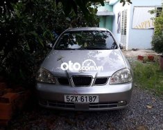 Daewoo Lacetti MT 2004 - Bán xe Daewoo Lacetti MT năm sản xuất 2004, màu bạc giá 122 triệu tại Tp.HCM