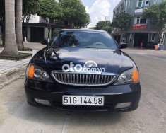 Daewoo Magnus AT 2004 - Cần bán xe Daewoo Magnus AT sản xuất năm 2004, màu đen, xe nhập giá 118 triệu tại Tp.HCM