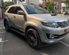 Toyota Fortuner G 2015 - Cần bán lại xe Toyota Fortuner G năm sản xuất 2015, màu bạc giá 670 triệu tại Tp.HCM