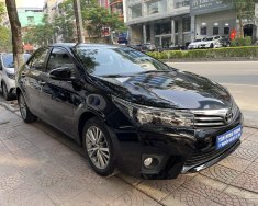 Toyota Corolla altis 2017 - Bán gấp Toyota Corolla Altis 1.8G AT năm 2017, màu đen, còn nguyên dàn lốp, xe rất mới, giá tốt giá 560 triệu tại Hà Nội