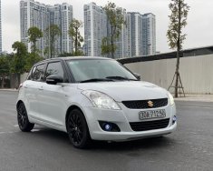 Suzuki Swift 2015 - Cần bán lại xe Suzuki Swift 1.4AT sản xuất 2015, màu trắng, giá tốt giá 375 triệu tại Hà Nam