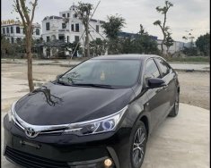 Toyota Corolla 2018 - Bán xe ô tô Toyota Corolla Altis 1.8G sản xuất năm 2018, màu đen, xe cá nhân sử dụng, start stop smartkey, giá cạnh tranh. giá 650 triệu tại Hà Nội