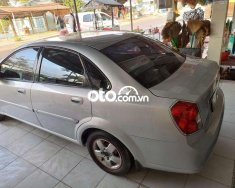 Daewoo Lacetti  EX 2005 - Cần bán gấp Daewoo Lacetti EX năm sản xuất 2005, màu bạc, giá 120tr giá 120 triệu tại Sóc Trăng