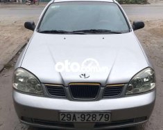 Daewoo Lacetti SE 2004 - Cần bán Daewoo Lacetti SE sản xuất năm 2004, màu bạc giá cạnh tranh giá 96 triệu tại Hà Nội