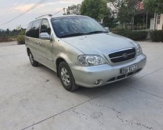 Kia Carnival GS 2009 - Cần bán lại xe Kia Carnival GS sản xuất năm 2009, màu bạc giá 205 triệu tại Hà Nội