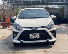 Bán Toyota Wigo 1.2 MT năm sản xuất 2020, màu trắng số sàn giá 306 triệu tại Tp.HCM