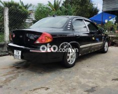 Kia Spectra   2004 - Cần bán gấp Kia Spectra năm 2004, màu đen, nhập khẩu  giá 78 triệu tại Kon Tum